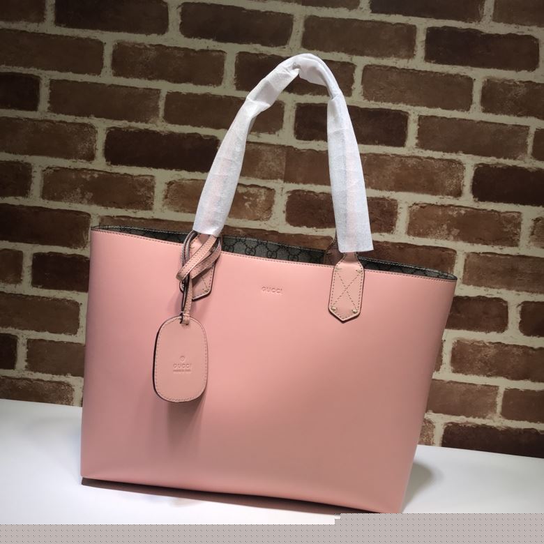 G*u*i shopping bags